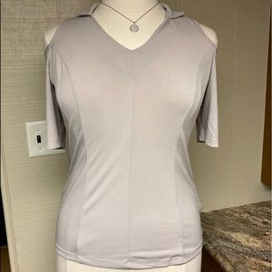 Tan cold shoulder top.